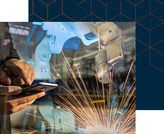 businessman is used smart phone control automate wireless Robot welding