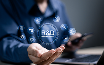 R&D, Research and Development concept. businessman use laptop with R and D icons on virtual screen for research and development of business science technology.