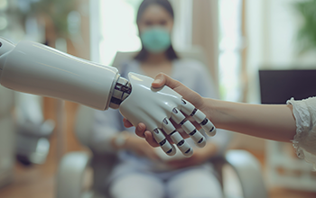 An AI robotic hand shaking a human hand in a medical setting symbolizing collaboration and trust between human and artificial intelligence in healthcare
